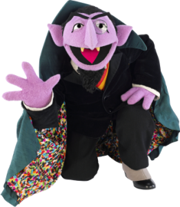 "Count von Count kneeling" by Source. Licensed under Fair use via Wikipedia