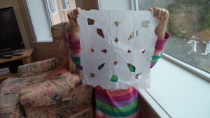 play with paper snowflake