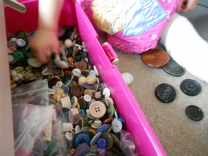 sensory play loose parts button play