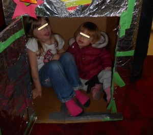 kids playing with boxes