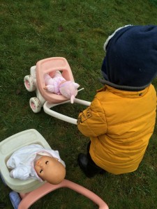 boy playing dolls gender equality